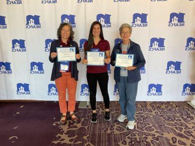 Johanna Hahn (former FNP Trainer), Camille McGuire (FNP Curriculum Specialist), and Jeanell Smith (SNAP-Ed Extension Agent) at the NEAFCS awards ceremony.